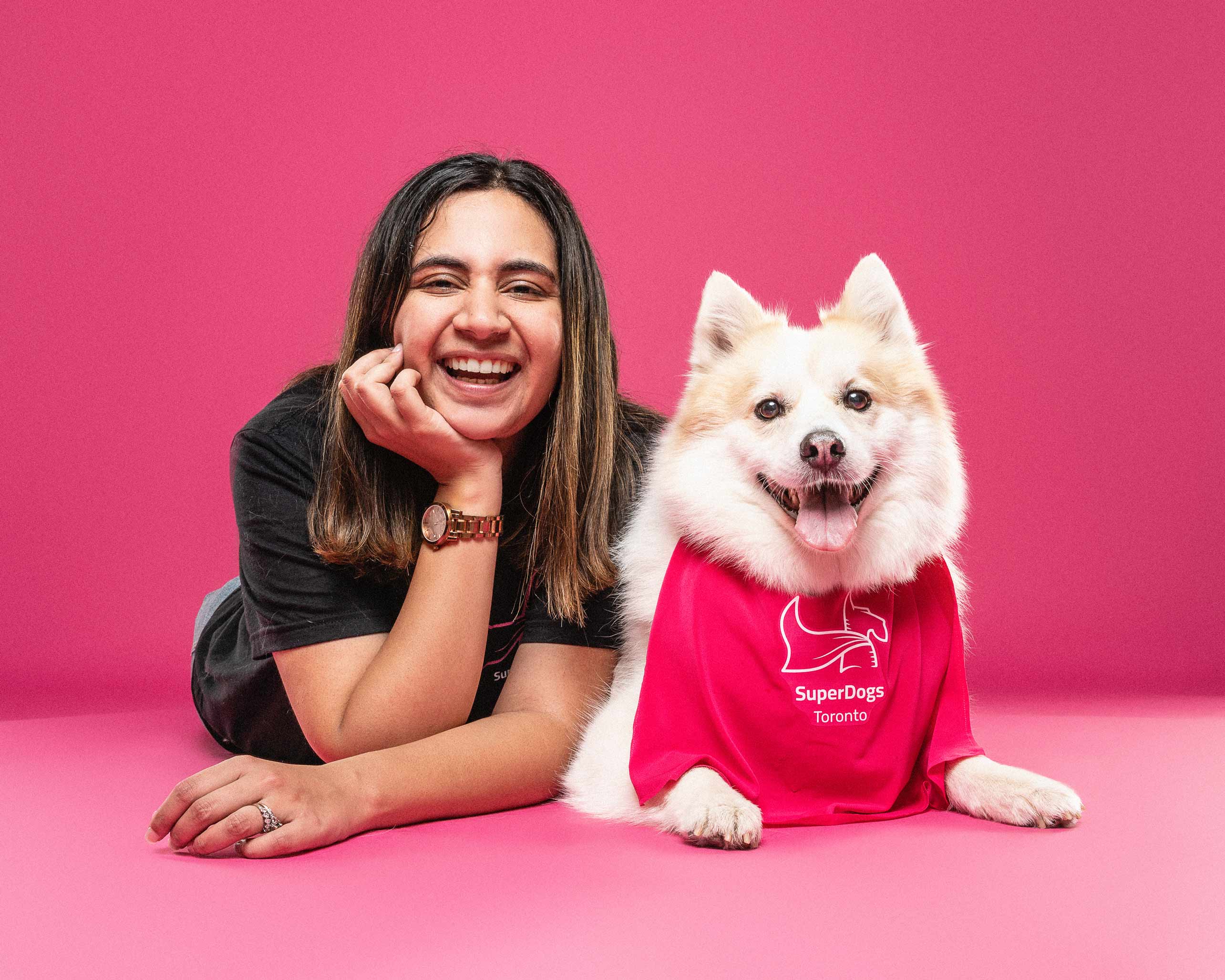 Kritika, founder of SuperDoggos Toronto, with her dog Coca